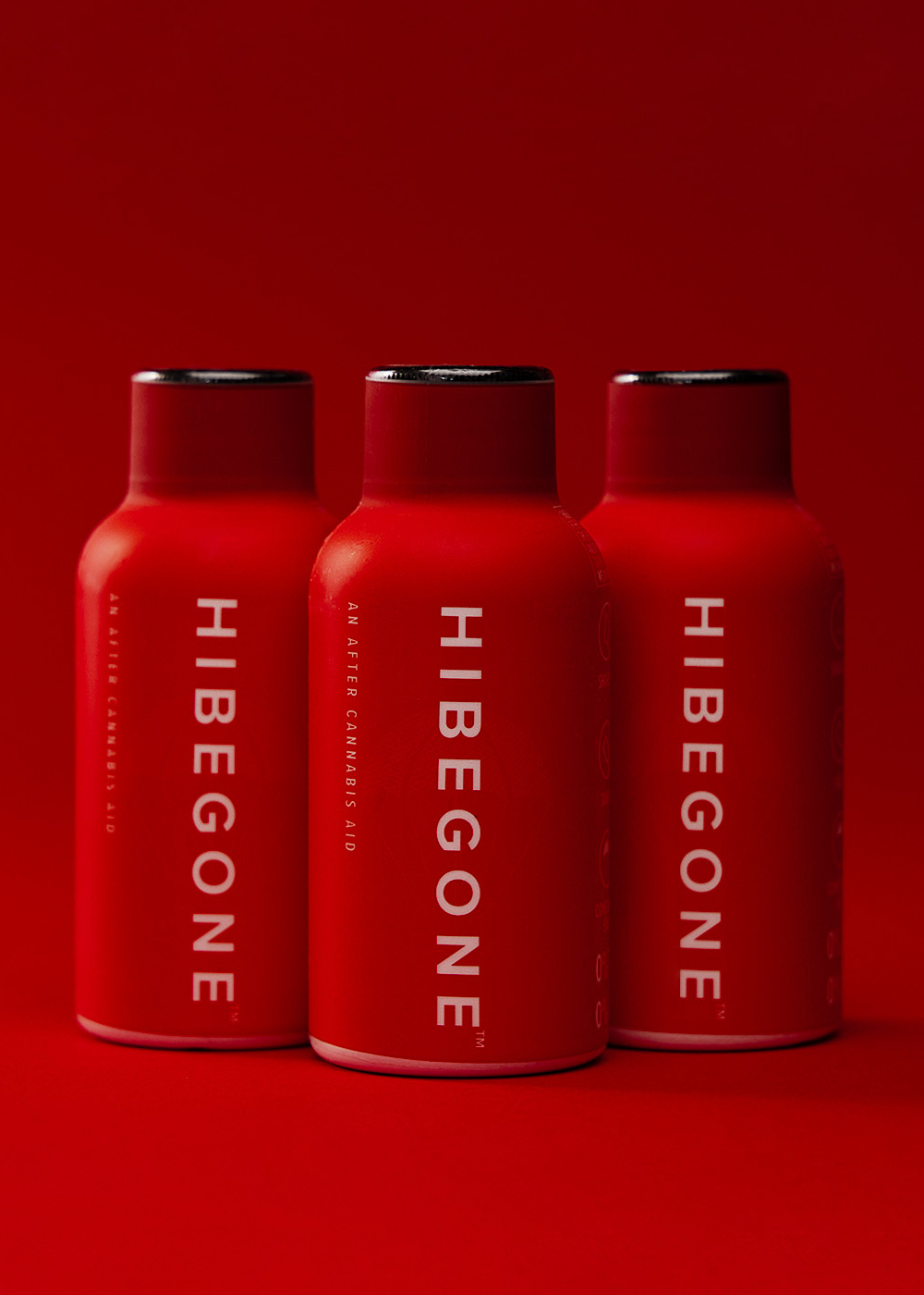 A product picture of 3 HIBEGONE bottles standing next to each other.